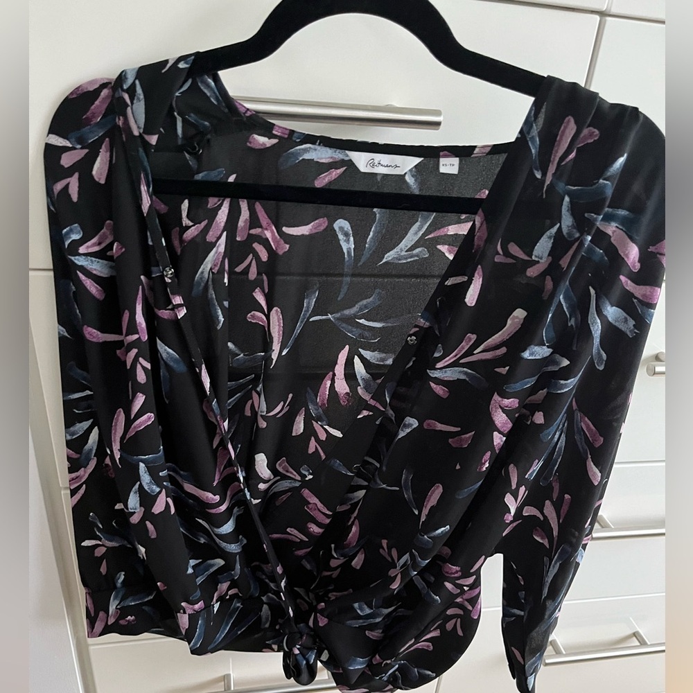 Three quarter sleeve wrap front blouse